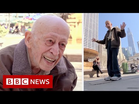 89-year-old dances in New York streets after Covid vaccination – BBC News