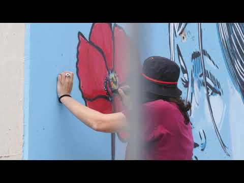 Mille papaveri rossi  – murales di Alice Pasquini a San Giovanni in Persiceto