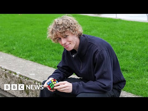 Rubik’s cube world champion solves puzzle in seven seconds live on air – BBC News