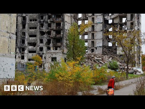 Mass burial sites grow in Ukrainian city bombarded by Russia – BBC News