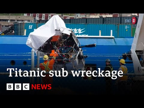 Titanic tourist sub wreckage brought ashore – BBC News